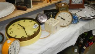A mixed lot including 6 clocks, 6 glasses, plate, toys etc.,