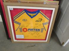 A framed signed Parramatta Eels NRL shirt donated to RAF Waddington rugby clun in 2009. COLLECT ONLY