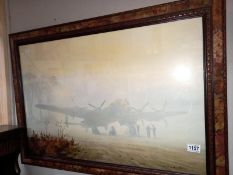 A framed & glazed print of a Lancaster Bomber in the mist (original by Coulson) 87cm x 82cm