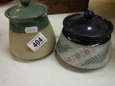 Two stoneware tobacco jars.