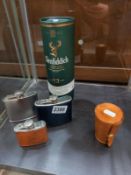 A bottle of Glenfiddich 12 year old malt, 3 hip flasks and a set of plated tumblers in case.