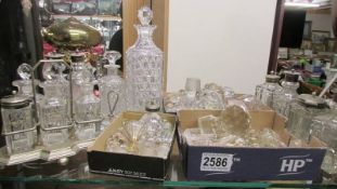 A mixed lot of cruet bottles, stands, decanter and other stoppers etc., COLLECT ONLY.