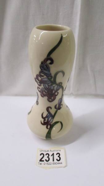 A Moorcroft vase, 16 cm.