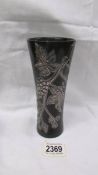 An unusual stone vase with silver decoration. 19cm tall.