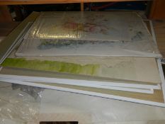A quantity of unframed paintings and prints.