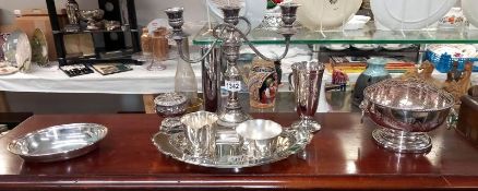 A selection of silver plate & other metal items including candelabra, posey bowls & trays etc.