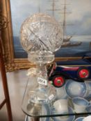 A mid Victorian cut glass table lamp.