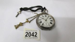 A silver pocket watch by Harrotini & Son, Bradford, watch and chronometer manufacturers,