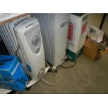 Five assorted heaters and a vacuum cleaner, COLLECT ONLY.