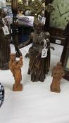 Three antique carved wood religious figures, 16, 18 and 30 cm.