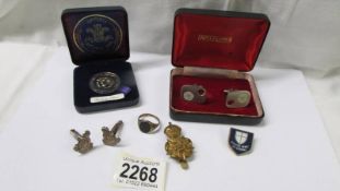 A pair of Yorkshire Dragoons silver cuff links, a 9ct gold ring, a Charles and Diana silver coin.