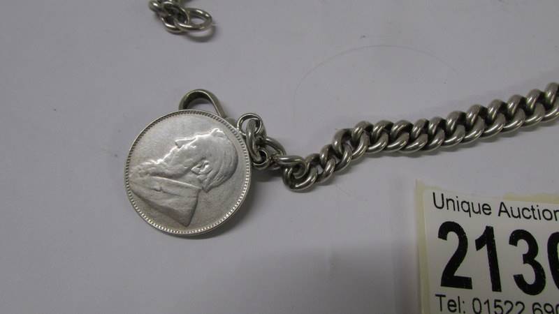 A heavy old kerb link chain with a one shilling coin, dated 1895. - Image 2 of 2