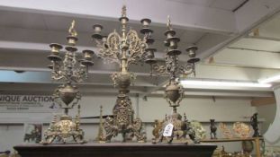 A pair of ormolu candelabra and one other. COLLECT ONLY.