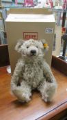 A boxed Steiff 125th anniversary Richard Steiff Teddy bear with growler.