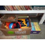 A quantity of toys including plastic car, tennis racket & a quantity of children's books