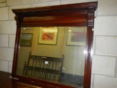 A mahogany bevel edged overmantel mirror. COLLECT ONLY.