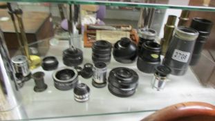 A mixed lot of assorted lenses.