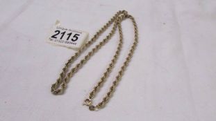 A long 9ct gold neck chain, 9 grams.