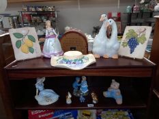 A quantity of miscellaneous figures including porcelain animal & child & plaques with fruit