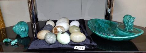 A glazed squirrel dish, snail and frogs plus quantity of stone egg hand coolers