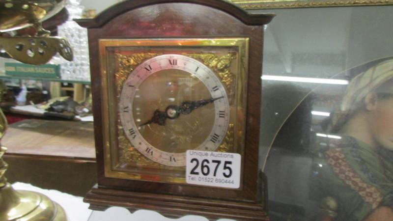 A good quality Elliot clock by Burrell, Sheffield.