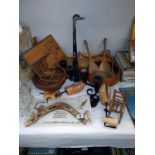 A quantity of treen/wooden items including shoe lasts, boomerang, inlaid plaque etc