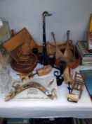 A quantity of treen/wooden items including shoe lasts, boomerang, inlaid plaque etc