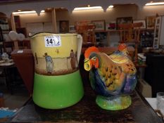 A vintage rooster teapot Rd No, 810175 (lid A/F) & a large Royal Doulton jug A/F