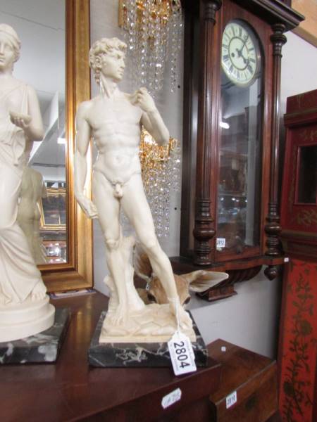 A pair of Grecian style figures on marble bases. - Image 2 of 3