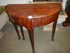 A Victorian mahogany D shaped drop side writing table. COLLECT ONLY.