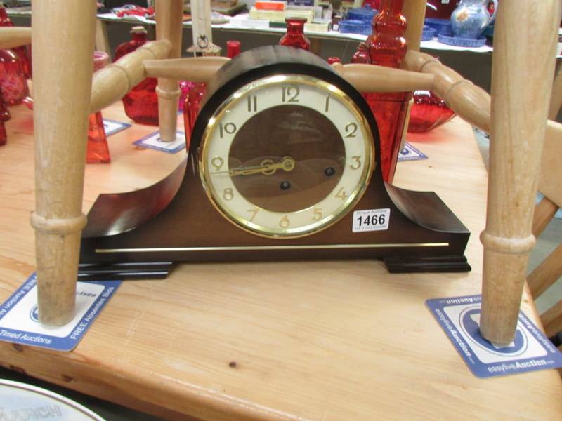 A Hermle chiming mantel clock.