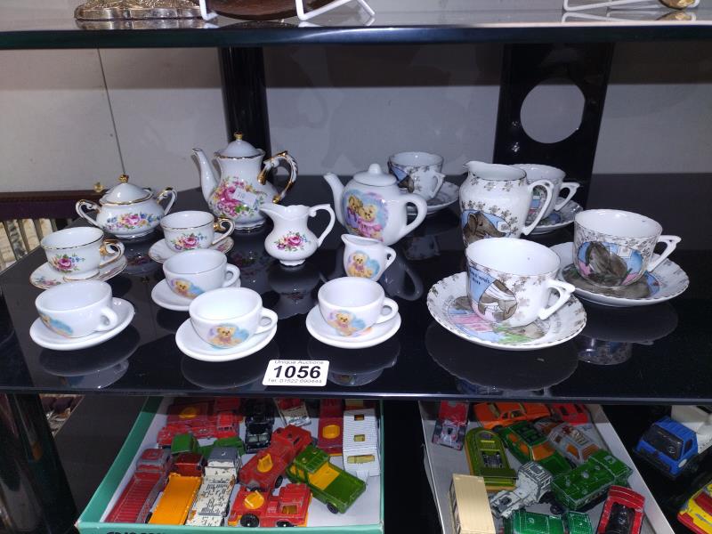 A quantity of miniature teacups and saucers etc