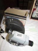 A Minicine slide projector, a Pathescope camera etc.,