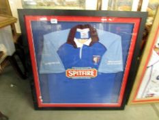 A framed 2013 Beccehamian RFC rugby football shirt from RAF Waddington Rugby club. COLLECT ONLY.