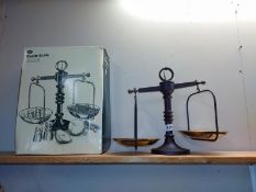 A vintage style boxed Boots beam kitchen scales (no weights)