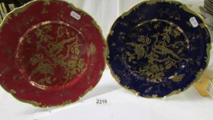 Two gold decorated cabinet plates (possibly Derby but markings obscured by plate hanger).