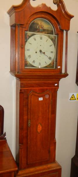 An 8 day mahogany cased Grandfather clock with shell inlaid door, complete with weights and pendulum