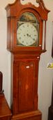 An 8 day mahogany cased Grandfather clock with shell inlaid door, complete with weights and pendulum