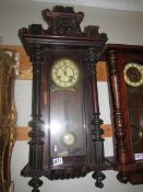 A mahogany Vienna wall clock in working order, COLLECT ONLY.