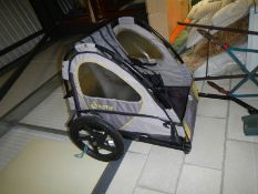 AN In-Step two person foldable bike trailer with harness, COLLECT ONLY.