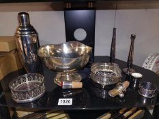 A mixed lot of silver plate including wine coaster, cocktail shaker etc