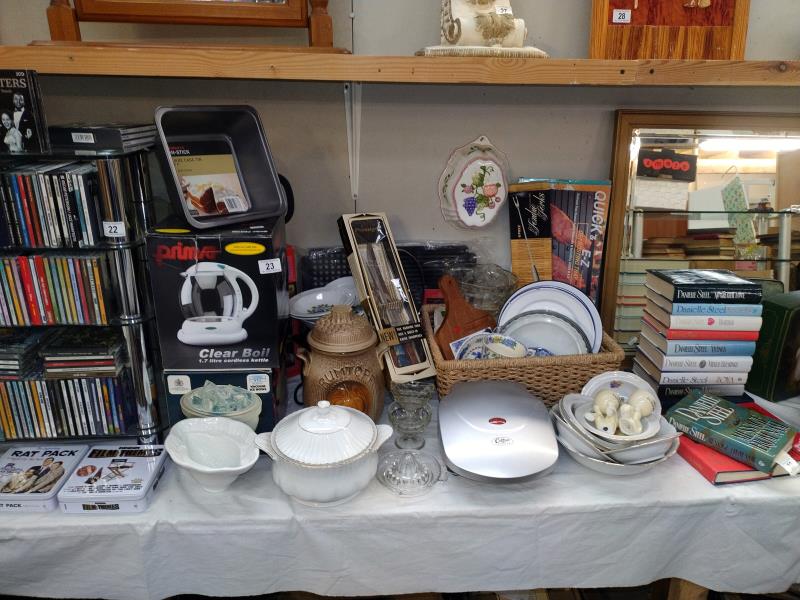 A good selection of kitchenalia including new kettle, jelly moulds, enamel plates, etc