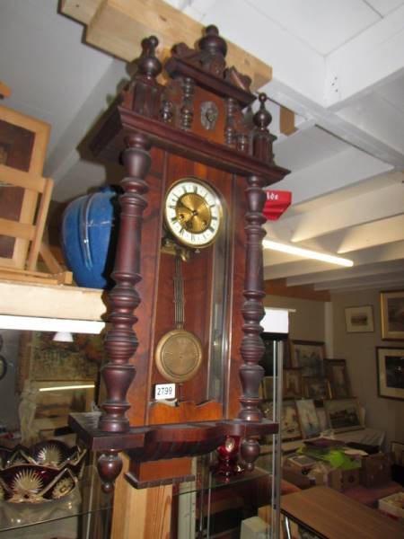 A Victorian mahogany wall clock. COLLECT ONLY.