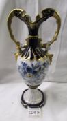 A Royal Dux twin handled vase.