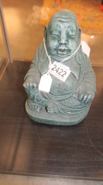 A heavy green painted Buddha. COLLECT ONLY.