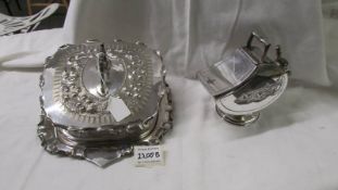 A Decorative silver plate cheese dish and a sugar scuttle with scoop.