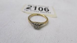 An 18ct gold diamond solitaire ring, size L. 2.4 grams.