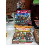 A collection of approximately 20 boxed jigsaw puzzles, unchecked