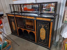 A mid Victorian inlaid mirror back chiffioniere with painted panels and Wedgwood roundels. COLLECT