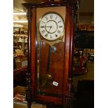 A mahogany Vienna wall clock in working order. COLLECT ONLY.